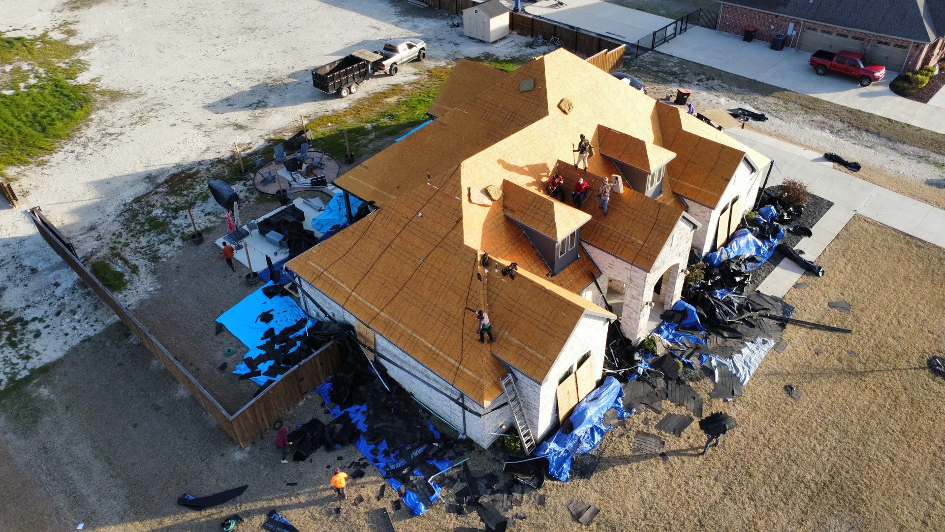 Storm-damaged roof replaced by KD Roofing in the DFW Metroplex — before